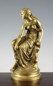 Etienne Henry Dumaige (French 1830-1888). A gilt bronze figure of a seated psyche, on circular