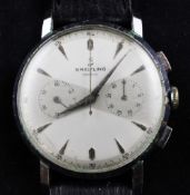 A gentleman`s early 1950`s stainless steel Breitling chronograph wrist watch, with baton numerals
