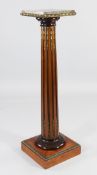 A late 19th century satinwood pedestal, with square marble top, reeded column and ormolu mounts, H.