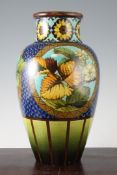 A Doulton Lambeth faience ovoid vase, dated 1882, decorated by Francis Smith, with fruiting and