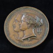 A Victorian bronze 1851 exhibition prize medal, the edge stamped Bartleet & Sons, class XXII prize