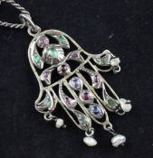 A French Art Nouveau silver gilt and multi gem set drop pendant, of hamsa hand design, on a later