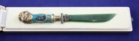 A cased Russian style silver gilt, nephrite enamel and diamond set letter opener, with owl`s head