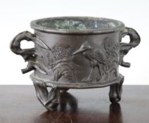 A Chinese bronze `bamboo` censer, Qing dynasty, finely cast and chased with bamboo sprig handles and