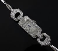 A lady`s 1920`s platinum and diamond cocktail wrist watch, with rectangular Arabic dial and