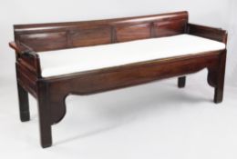 A Chinese rosewood hall seat, the scrolled back with four raised oval panels, with rectangular