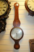 An Edwardian marquetry inlaid mahogany wheel barometer, with silvered dial signed Lione & Co. 14