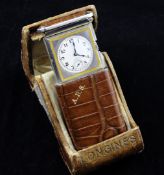 A 1930`s Art Deco leather cased steel and yellow enamel Longines travelling purse watch, with