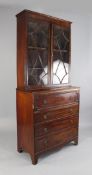 A 19th century mahogany secretaire bookcase, fitted a pair of astragal glazed doors above a single