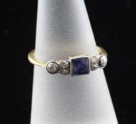 An early 20th century 18ct gold and platinum, sapphire and diamond ring, with square cut sapphire