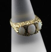 A Victorian style 18ct gold, graduated white opal and diamond half hoop ring, set with three opals