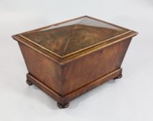 A 19th century mahogany rectangular sarcophagus shape wine cooler, with castor feet, W.2ft 6.5in.