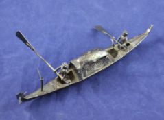 An early 20th century continental silver miniature model of a gondola, with engraved decoration
