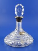 A 1960`s silver mounted cut glass ship`s decanter and stopper, Harrod`s Ltd, London, 1966, 10.5in,