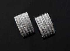 A pair of Italian 18ct white gold and pave set diamond U-shaped earrings, post 1968 mark, 0.75in