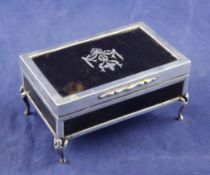 A George V silver and tortoiseshell mounted trinket box, of rectangular form with silver pique