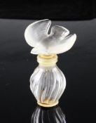 A Lalique L`Air du Temps perfume bottle and stopper, modelled with a dove, 2.75in.
