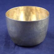 A Charles II silver tumbler cup, of circular form, with engraved armorial, no maker`s mark,