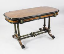A Victorian amboyna and ebonised library table, with ormolu beading and ivory inset underframe,