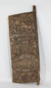 A West African Senugo granary door, carved with masks and various animals, overall height 61.5in.