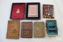 A collection of various card cases, including a Cantonese carved boxwood example, other