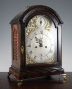 A George III ebonised pear wood hour repeating bracket clock, the arched silvered dial inscribed