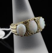 A Victorian style 18ct gold graduated white opal and diamond half hoop ring, with reeded