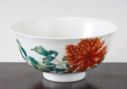 A Chinese famille verte bowl, 19th century, painted with iron-red flowers and green foliage, four