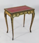 A 19th century French walnut writing table, with gilt brass mounts and rectangular red leather and