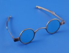 A pair of George III silver spectacles, with tinted blue lenses, maker, TH?, London, 1817.