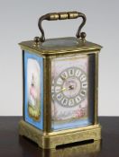 A late 19th century French gilt brass and porcelain carriage clock, the Roman dial decorated with