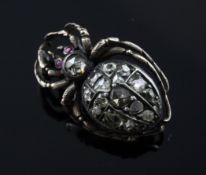 A Victorian gold and silver, rose cut diamond and cabochon ruby set spider brooch, 0.75in.