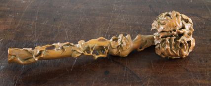A Chinese boxwood ruyi sceptre, the stem carved with leaves, the head with finger citron, 34cm.