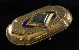A 19th century French ormolu necessaire set, the lid mounted with malachite and lapis lazuli panels,