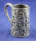 A mid 19th century Chinese silver christening mug by Khecheong, Canton (c.1840-1870), of tapering