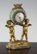 A gilt metal mounted jasper ware desk timepiece, with enamelled arabic dial, paste set bezel and