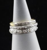 Two white gold and diamond set full eternity rings and an 18ct gold and platinum diamond half