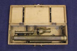 A 19th century brass telescope and stand, together with fitted case, overall 21in.