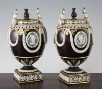 A pair of unusual Wedgwood Drabware neo-classical vases and covers, early 19th century, each of