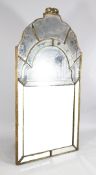 A 19th century Venetian style arched wall mirror, with bevelled glass panels, 5ft 7in. x 2ft 11in.