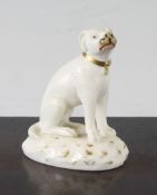 A rare Rockingham porcelain model of a seated Pointer, c.1826-30, white glazed with gilt collar