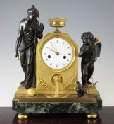 A 19th century French bronze and ormolu mantel clock, mounted with figures of Venus and Cupid,