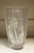 A modern Lalique vase, moulded and frosted with leaves, engraved mark Lalique France, 9.25in.