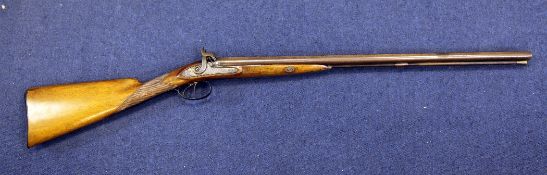 A 19th century muzzle loading double barrel shotgun, with percussion lock signed Noon, with damascus