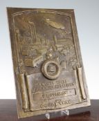 A cast brass Goodyear loyalty plaque, for 20 years of friendly relations to E.U. Stanley,