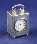 An early 20th century continental engine turned silver miniature carriage timepiece, of