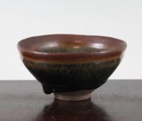A Chinese Jian ware "hare`s fur" teabowl, Song / Jin Dynasty, with brown glaze to the rim graduating