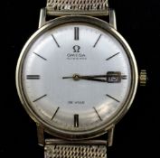 A gentleman`s late 1960`s 9ct gold Omega De Ville Seamaster automatic wrist watch, with baton