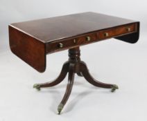 A Regency mahogany sofa table, with two frieze drawers opposing two dummy drawers, with central