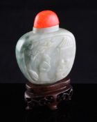 A Chinese white and green jadeite snuff bottle, each side carved in relief with figure scenes, 1.